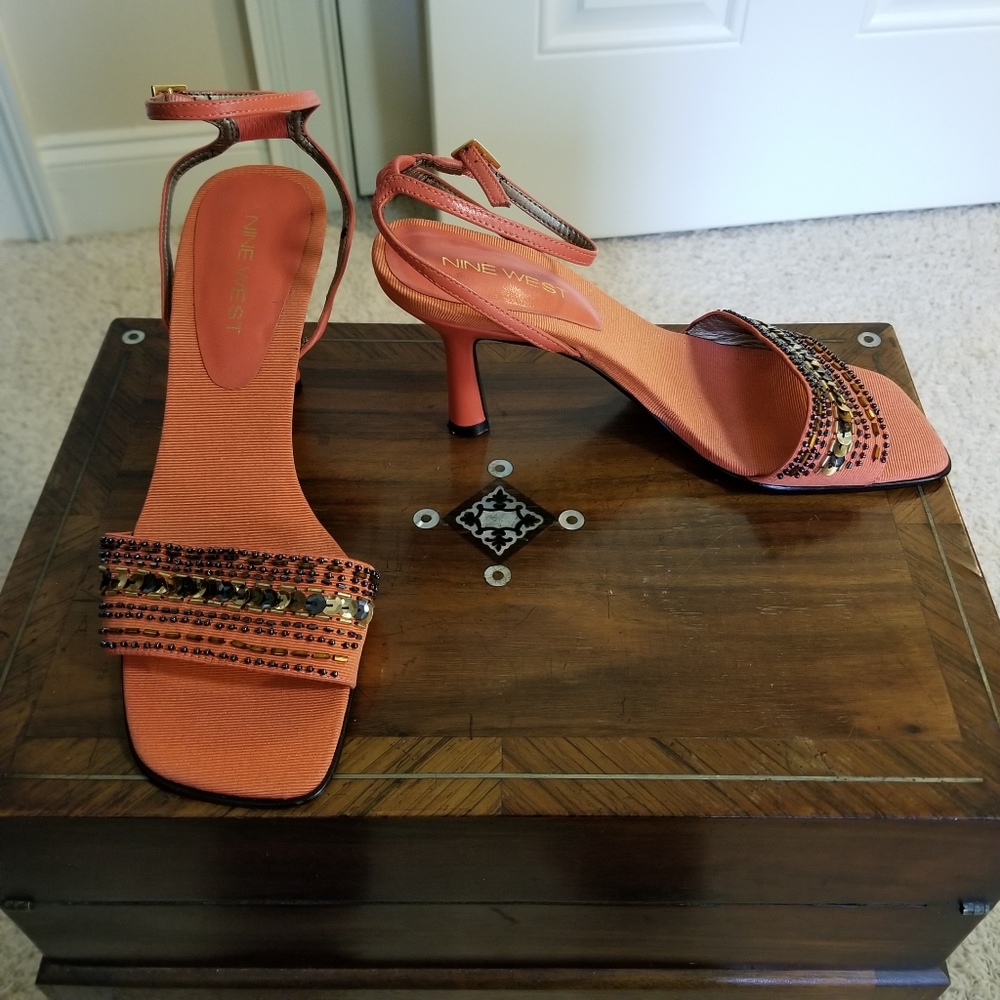Like new Nine West salmon color beaded sandals. Size 6.5.  Excellent condition.